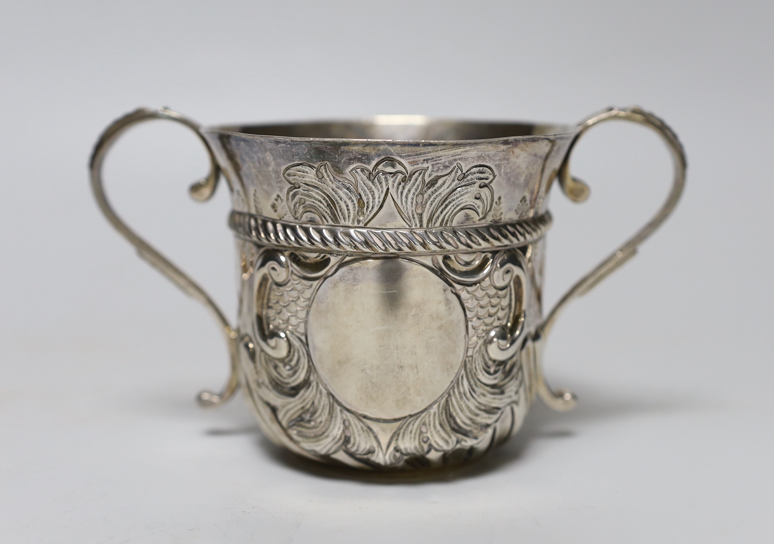 A George V 17th/18th century style Brittania standard silver porringer, Harry Freeman, London, 1911, height, 89mm, 6.1oz.